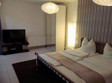 Фото номера Апартаменты-студио (для 4 взрослых) Апартаменты Apartamenty Krzywe Okna г. Зелёна-Гура 10